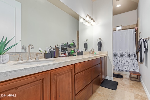 bathroom with vanity and tile patterned floors