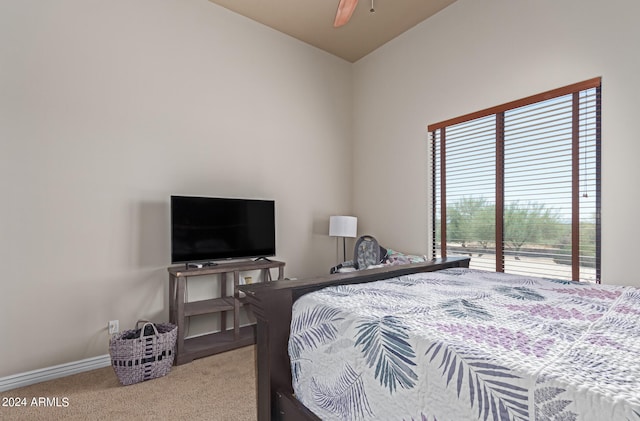 bedroom with light carpet and ceiling fan