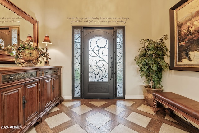 entryway featuring light parquet floors