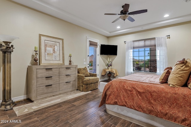 bedroom featuring dark wood-type flooring and ceiling fan