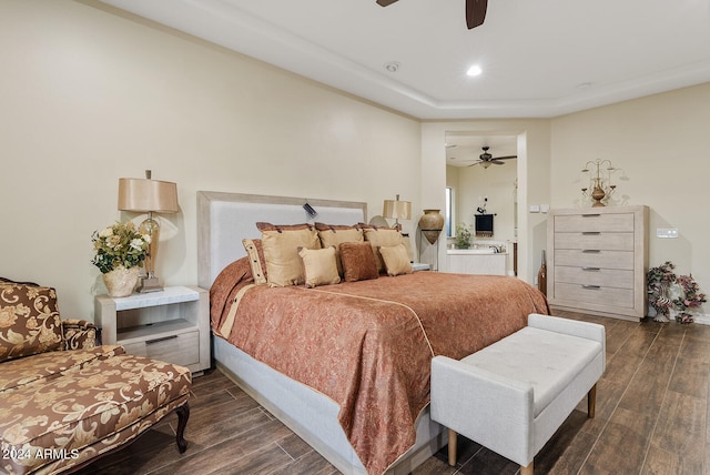 bedroom featuring ceiling fan and dark hardwood / wood-style flooring