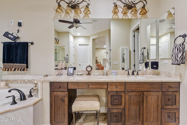 bathroom with vanity, ceiling fan, and a relaxing tiled tub