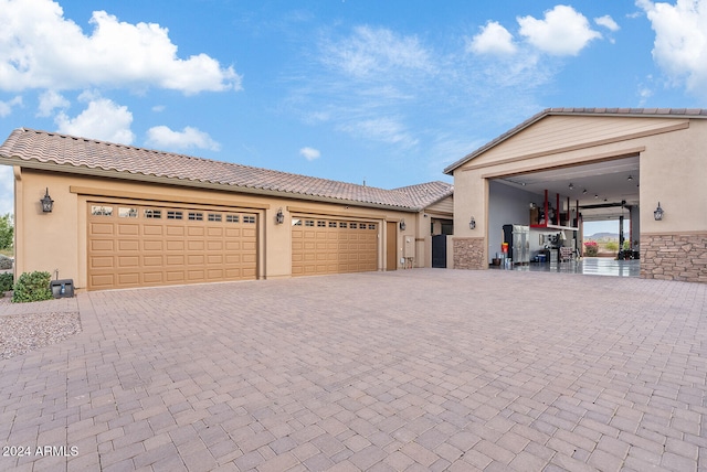 view of front of home with a garage