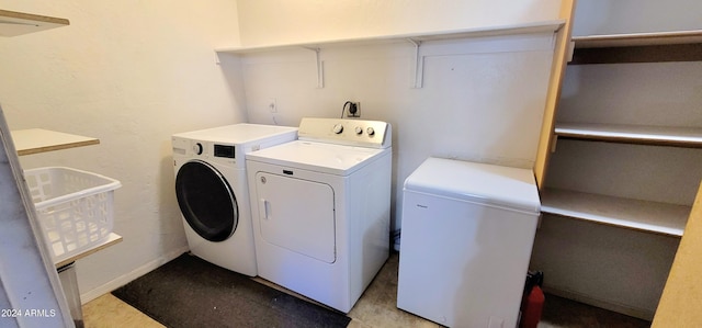 washroom featuring separate washer and dryer