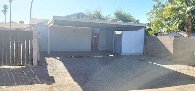 garage featuring a carport