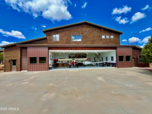 2335 Voyager Cir, Overgaard, AZ 85933 - view of side of property featuring driveway and a patio area