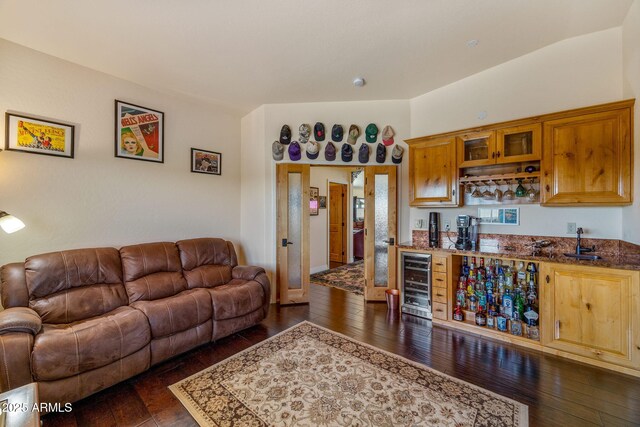 2335 Voyager Cir, Overgaard, AZ 85933 - living area with beverage cooler, wet bar, and dark wood finished floors