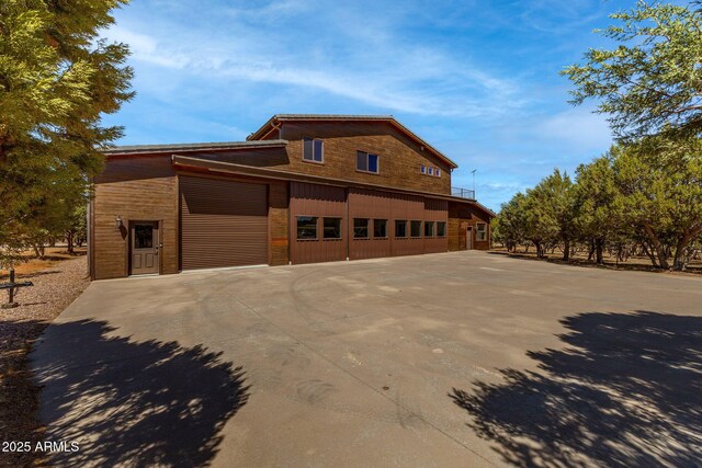2335 Voyager Cir, Overgaard, AZ 85933 - view of property exterior with driveway