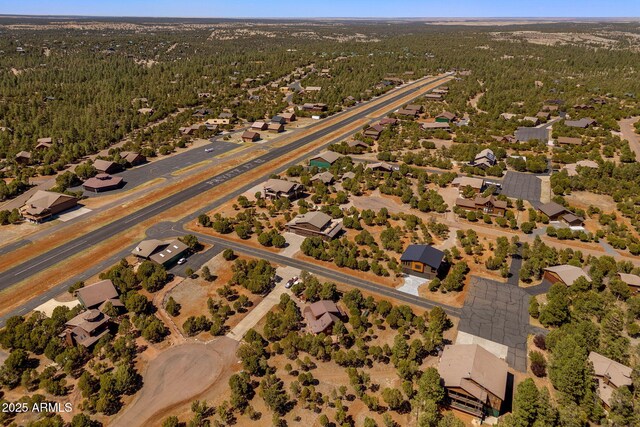 2335 Voyager Cir, Overgaard, AZ 85933 - aerial view of property's location featuring a forest and nearby suburban area