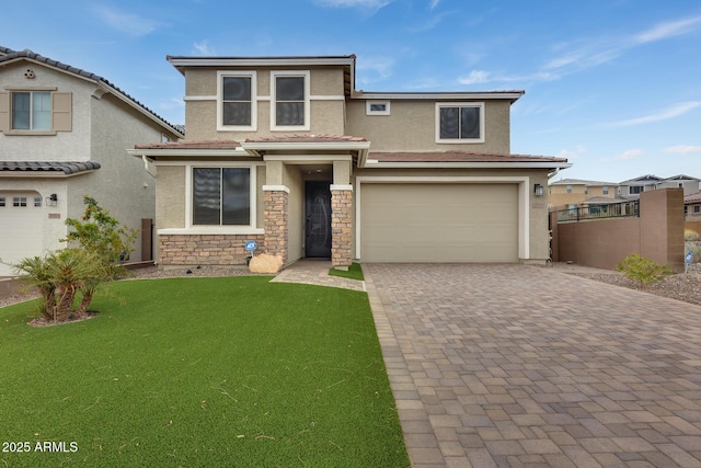 view of front of home with stucco siding, a front lawn, decorative driveway, stone siding, and an attached garage