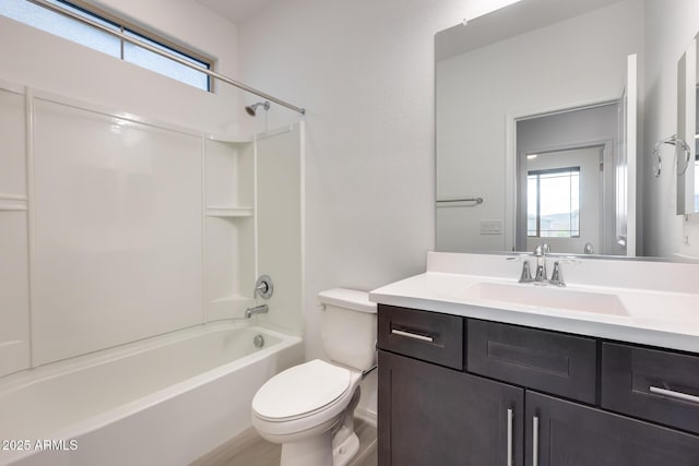 full bathroom featuring vanity, toilet, and tub / shower combination