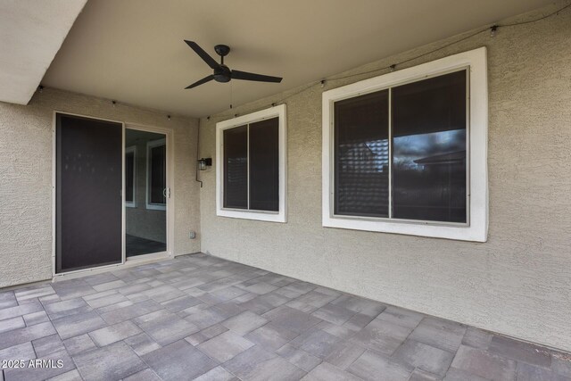 view of patio / terrace with a ceiling fan