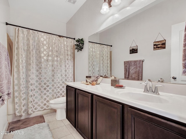 full bathroom with visible vents, toilet, shower / tub combo with curtain, tile patterned flooring, and vanity