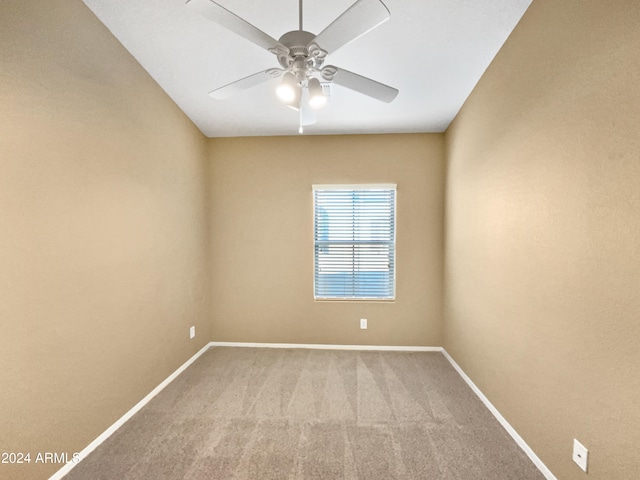 carpeted empty room with ceiling fan