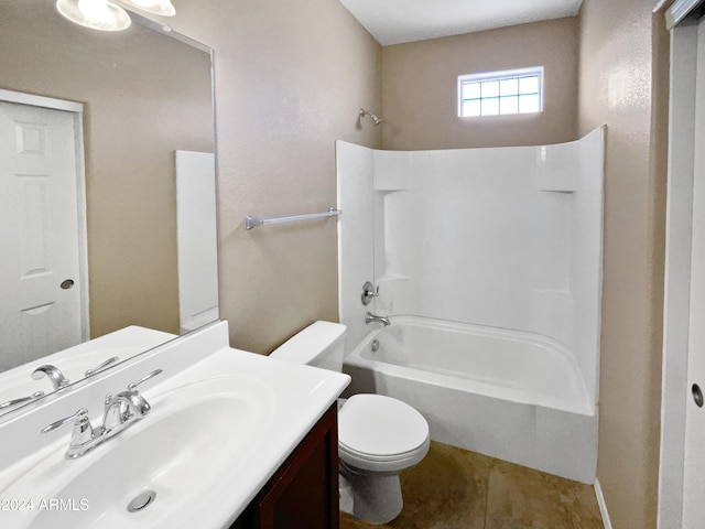 full bathroom with tile patterned floors, toilet, vanity, and tub / shower combination