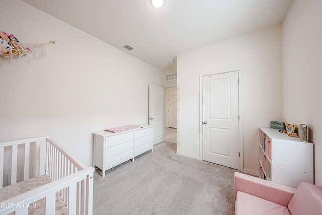 5721 W Coplen Farms Rd, Laveen, AZ 85339 - bedroom featuring light carpet, a crib, and baseboards