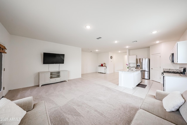 5721 W Coplen Farms Rd, Laveen, AZ 85339 - living area with recessed lighting, light tile patterned flooring, and light colored carpet