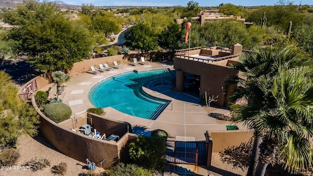 view of pool featuring a patio