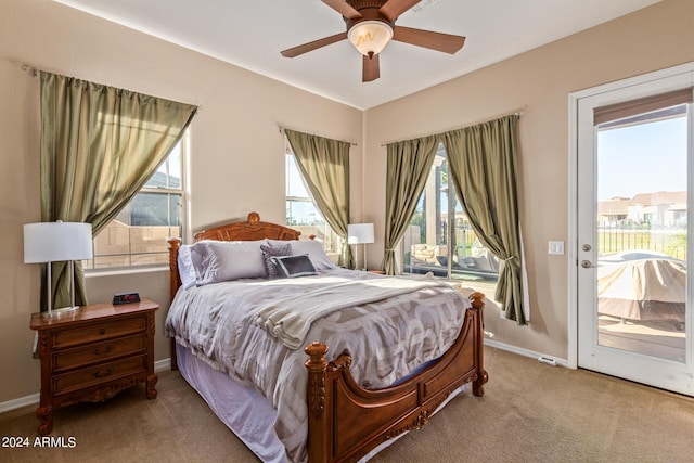 bedroom featuring carpet flooring, access to outside, and ceiling fan