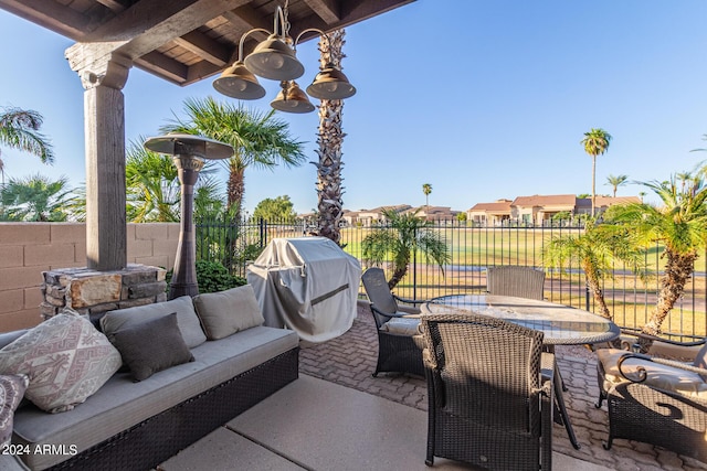 view of patio / terrace with an outdoor living space and grilling area