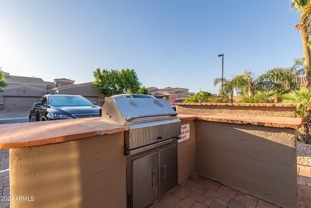 view of patio with an outdoor kitchen