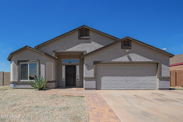 view of front of home featuring a garage