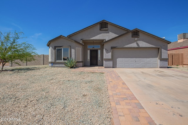 view of front of property with a garage