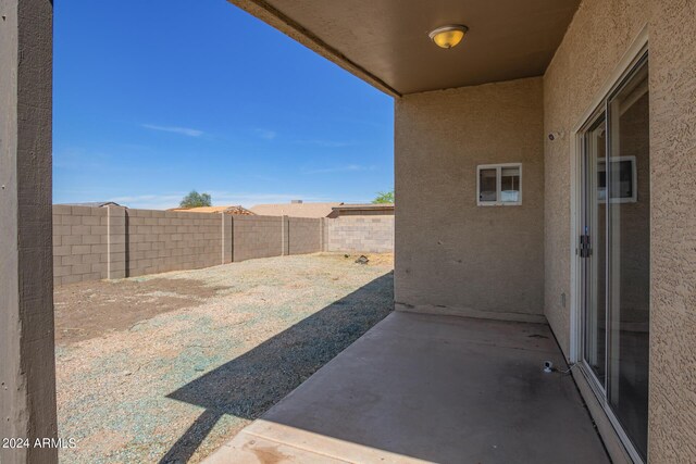 back of property featuring a patio