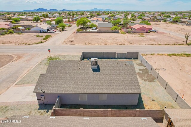 birds eye view of property featuring a mountain view