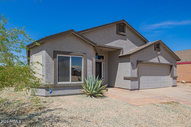 view of front of home featuring a garage