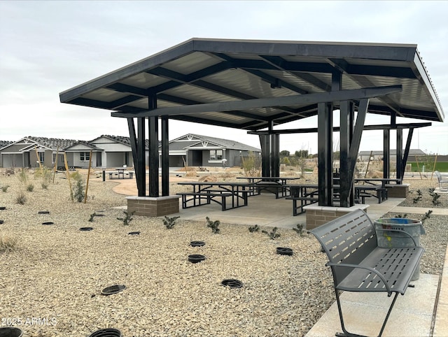 surrounding community featuring a patio and a gazebo