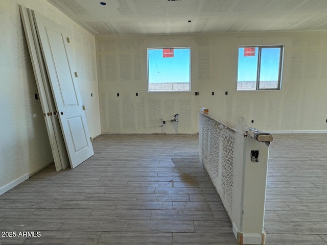 laundry room with light wood-type flooring