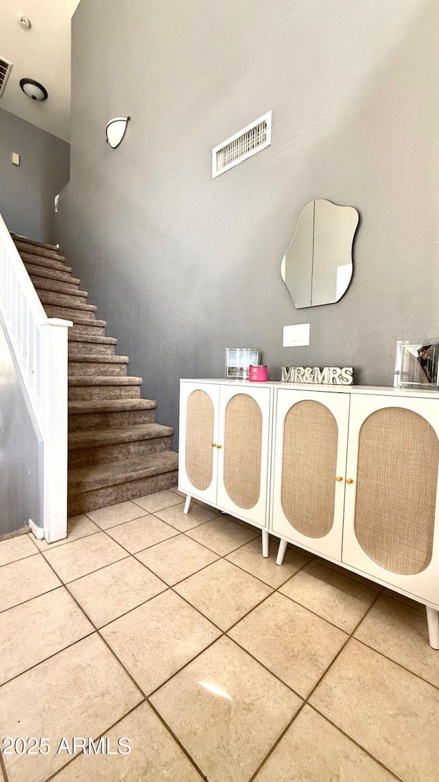 laundry room featuring tile patterned floors