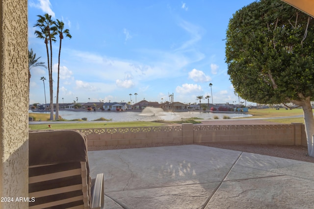 view of patio / terrace with a water view