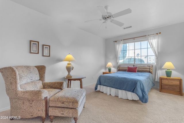 bedroom with ceiling fan and carpet