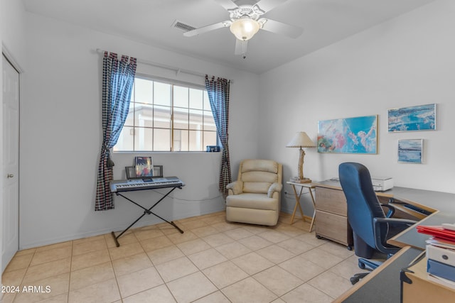 home office featuring ceiling fan and light tile patterned flooring