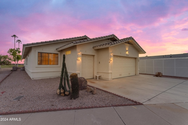 view of front of home with a garage