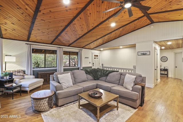 living area with wooden ceiling, a ceiling fan, light wood-style floors, and wood walls