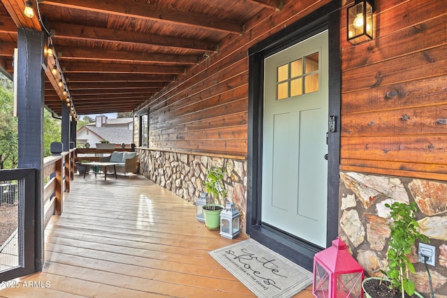 wooden deck with a porch