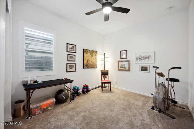 interior space with carpet and ceiling fan