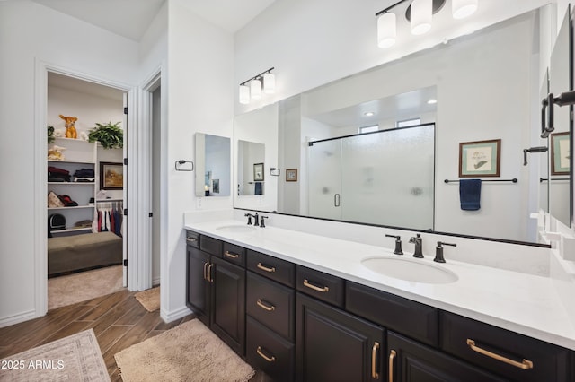 bathroom with vanity and walk in shower