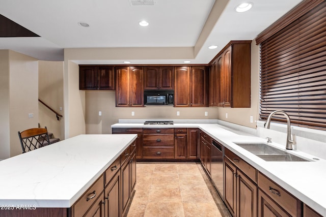 kitchen featuring sink and black appliances