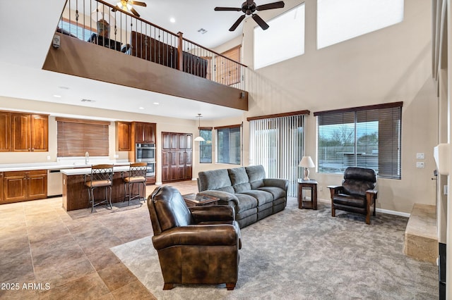 living room featuring ceiling fan