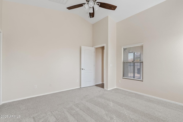 unfurnished room featuring high vaulted ceiling, light colored carpet, and ceiling fan