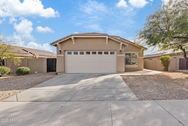 view of front of home with a garage