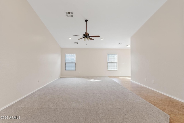 empty room featuring light carpet and ceiling fan