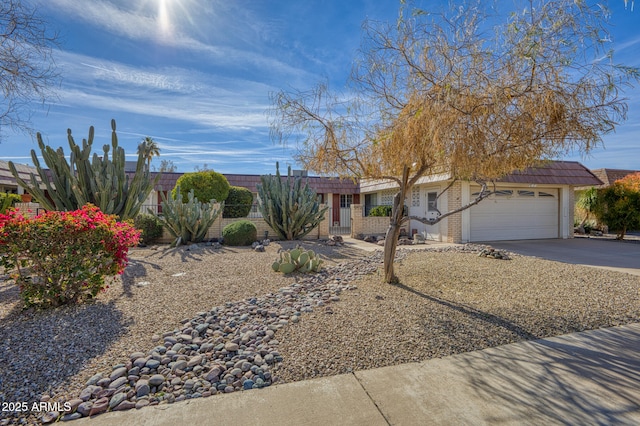 single story home featuring a garage