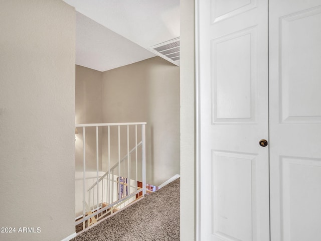 hallway with carpet