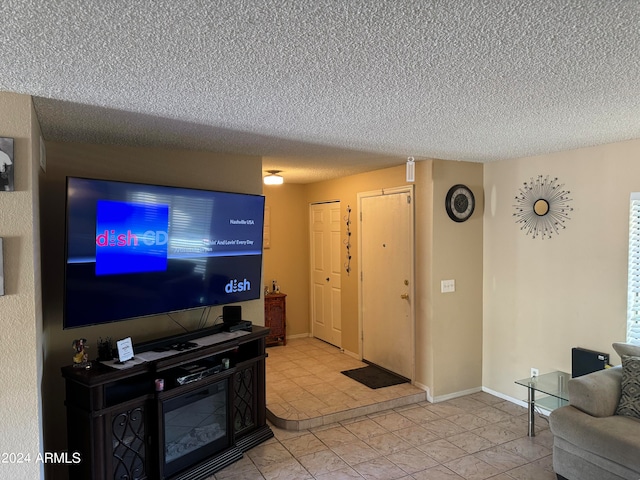 living room featuring a textured ceiling