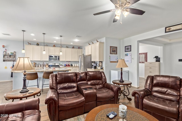 5218 W Lydia Ln, Laveen, AZ 85339 - living area featuring visible vents, ceiling fan, recessed lighting, and baseboards